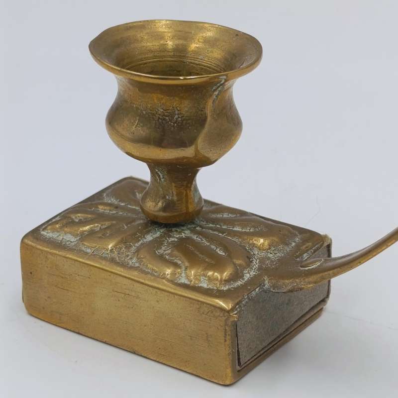 Vintage brass candle holder with matchbox