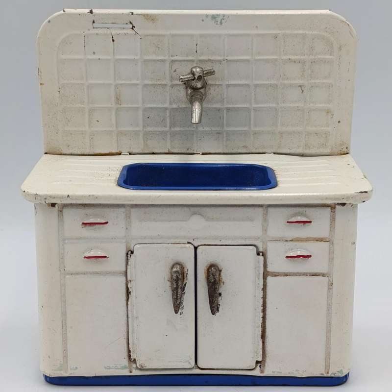 Vintage tinplate doll house kitchen sink with cupboard