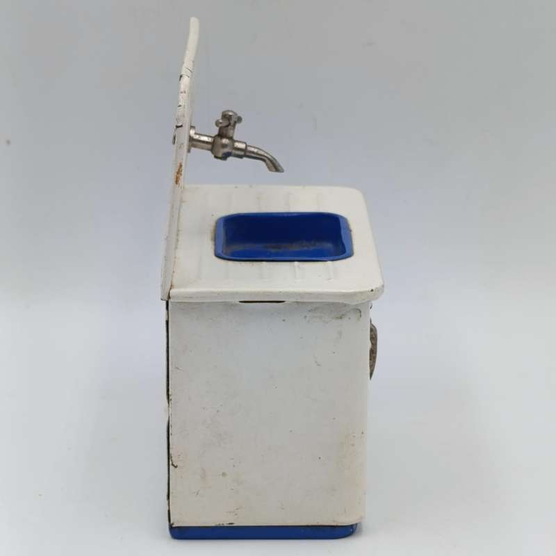 Vintage tinplate doll house kitchen sink with cupboard