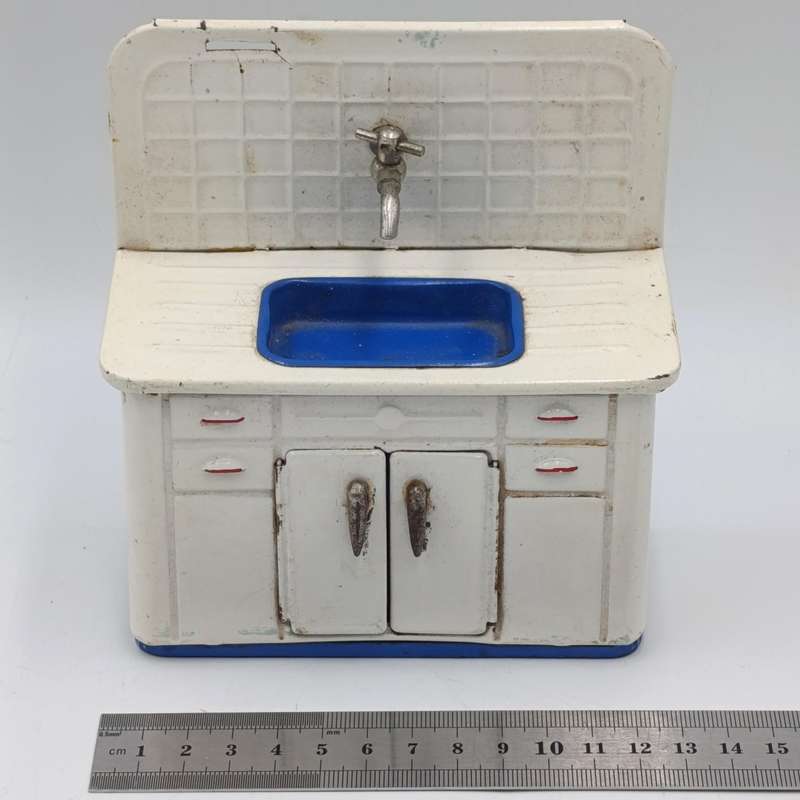 Vintage tinplate doll house kitchen sink with cupboard