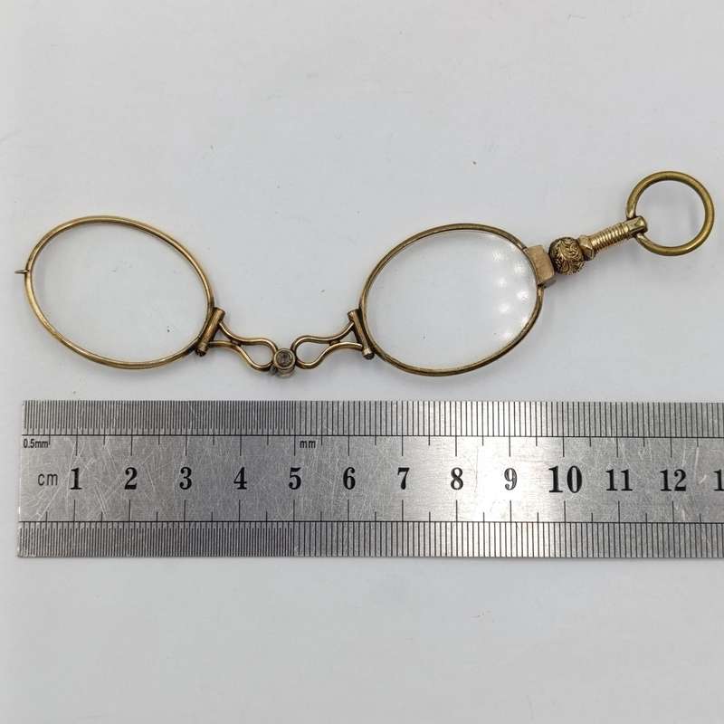 Antique goldplated lorgnette folding glasses in pouch