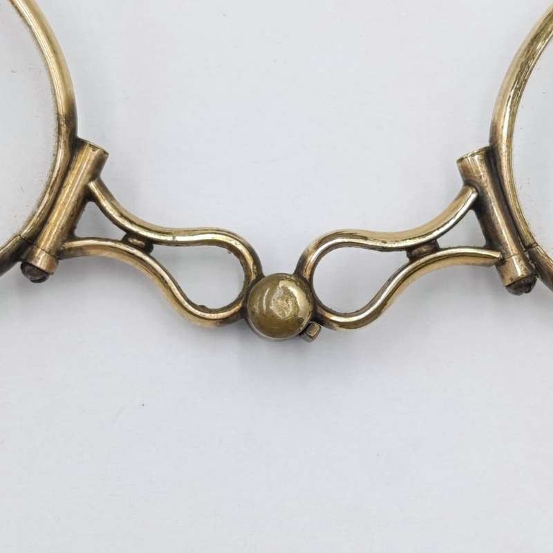 Antique goldplated lorgnette folding glasses in pouch