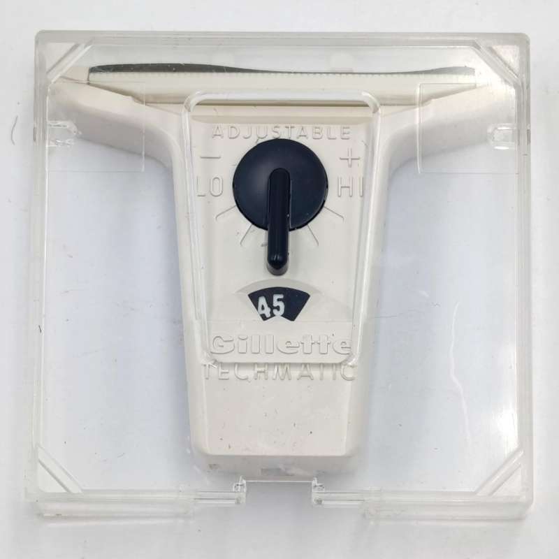 Vintage Gillette Techmatic razor with 7 extra cartridges