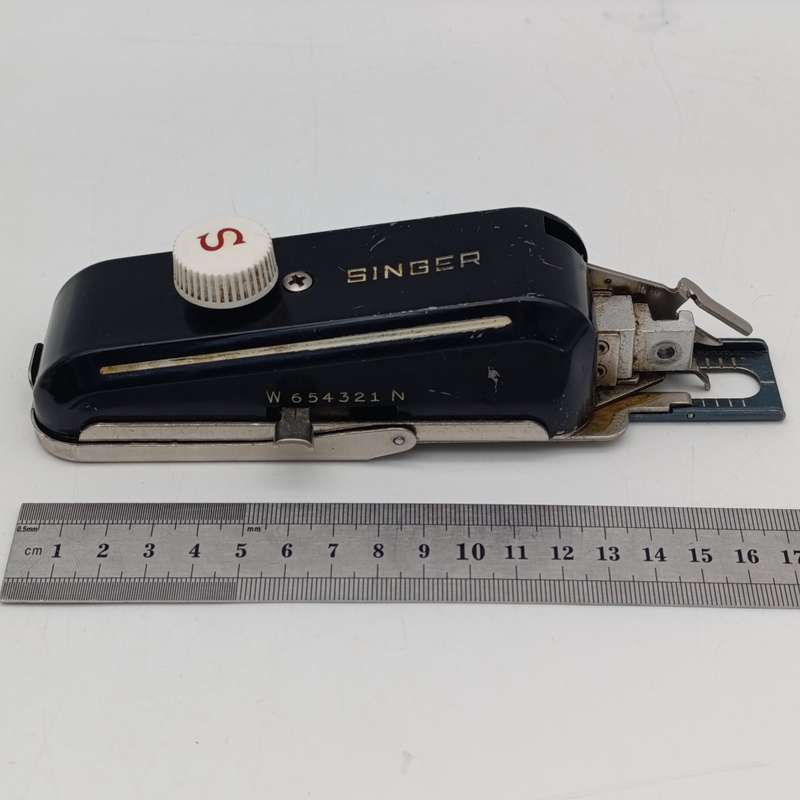 Vintage Singer button hole stitcher attachment