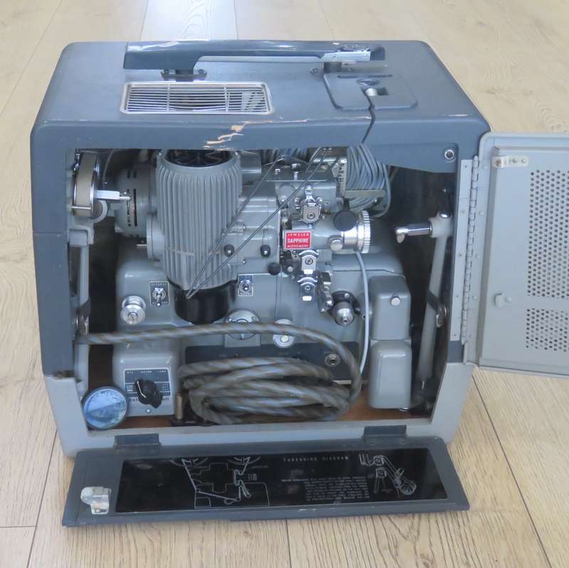 Bell and Howell Filmosound Specialist 16mm projector - working - some case damage