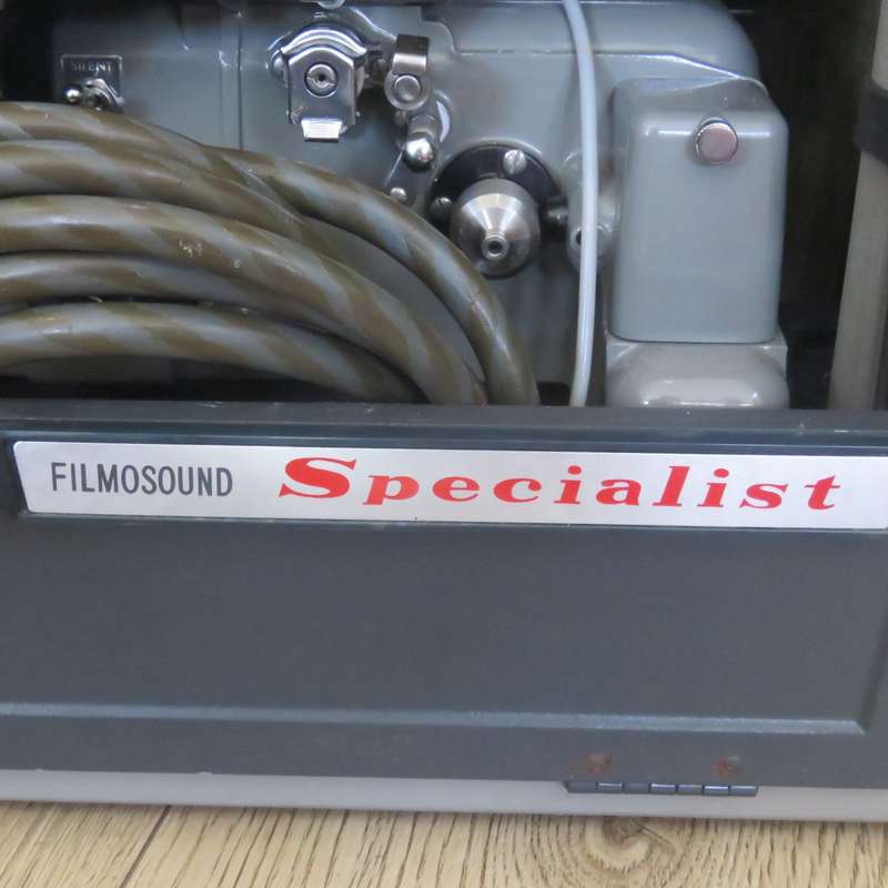 Bell and Howell Filmosound Specialist 16mm projector - working - some case damage
