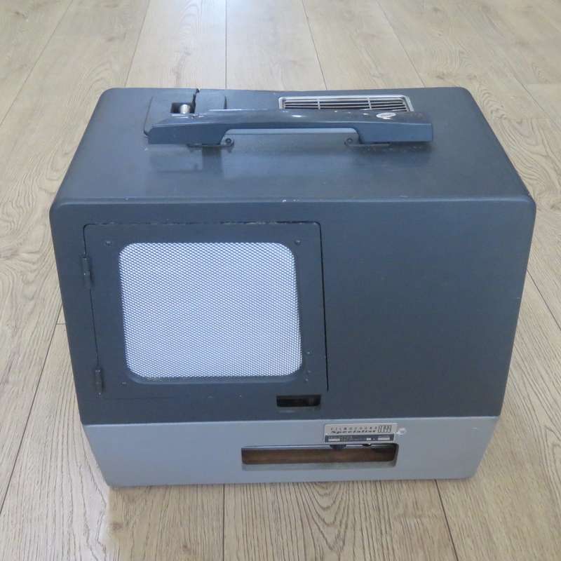 Bell and Howell Filmosound Specialist 16mm projector - working - some case damage