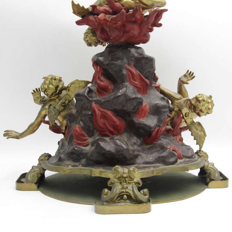 Vintage Large bronze statue of Archangel Michael casting the devil and demons into hell.