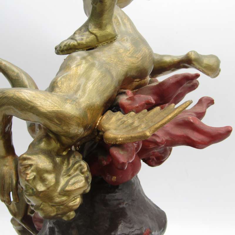 Vintage Large bronze statue of Archangel Michael casting the devil and demons into hell.