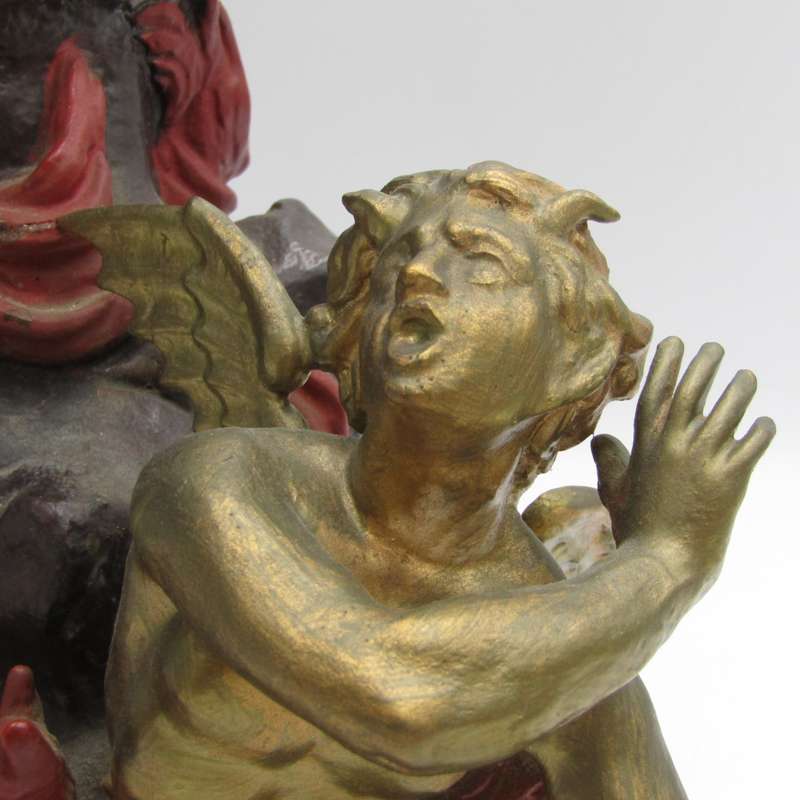 Vintage Large bronze statue of Archangel Michael casting the devil and demons into hell.