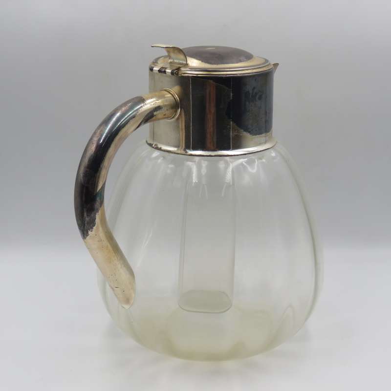 Vintage glass pitcher with silverplated top presented to SADF Chief of Staff Lieutenant - General J.