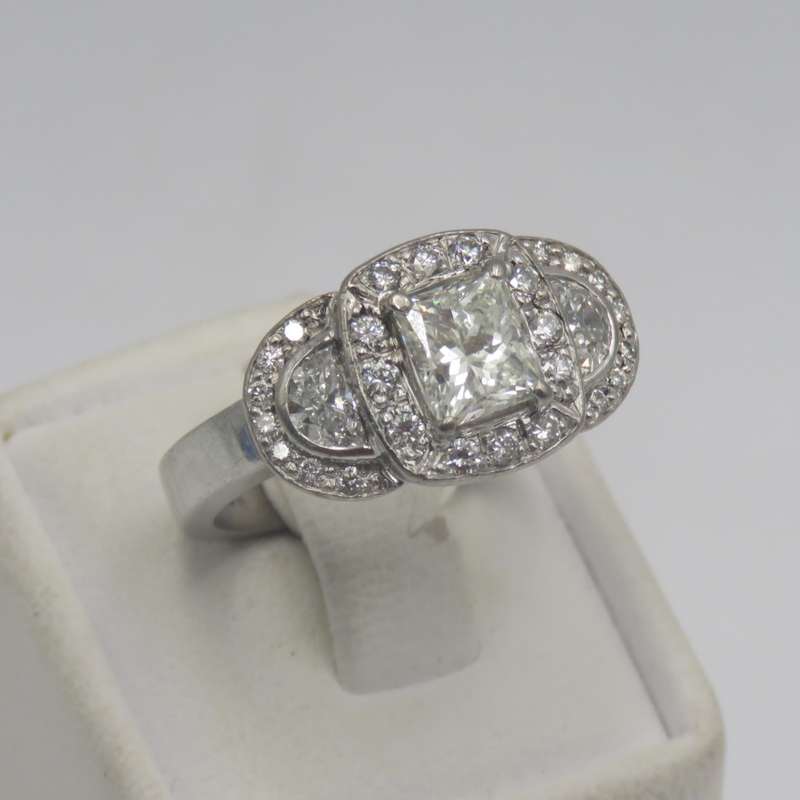 Bespoke 9kt white gold diamond ring with 1,09ct Princess cut diamond with 2 x colour D/E half moon