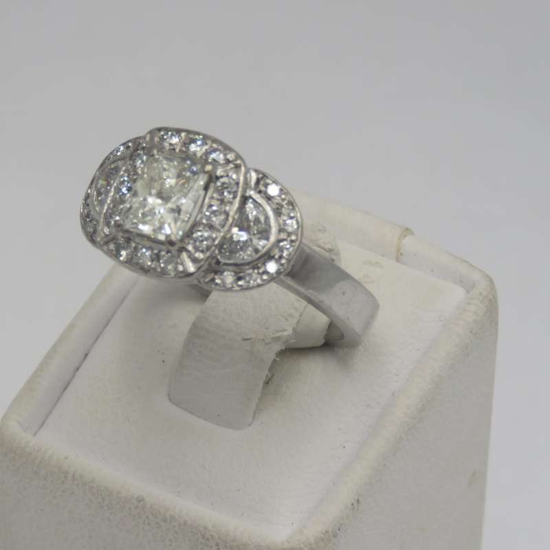 Bespoke 9kt white gold diamond ring with 1,09ct Princess cut diamond with 2 x colour D/E half moon