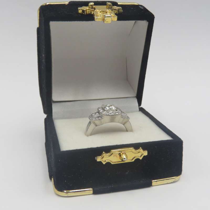 Bespoke 9kt white gold diamond ring with 1,09ct Princess cut diamond with 2 x colour D/E half moon