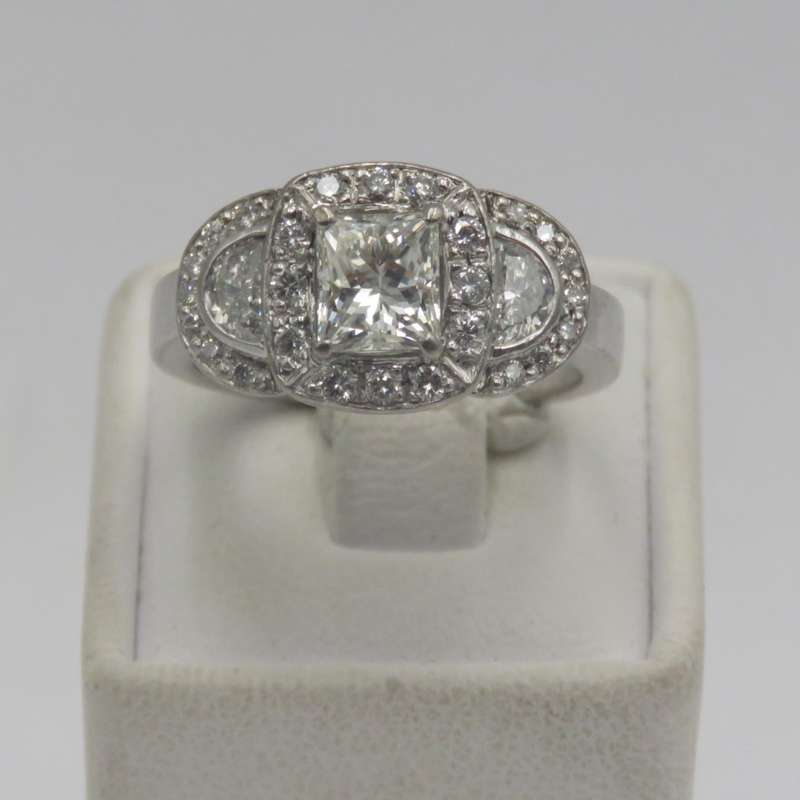 Bespoke 9kt white gold diamond ring with 1,09ct Princess cut diamond with 2 x colour D/E half moon