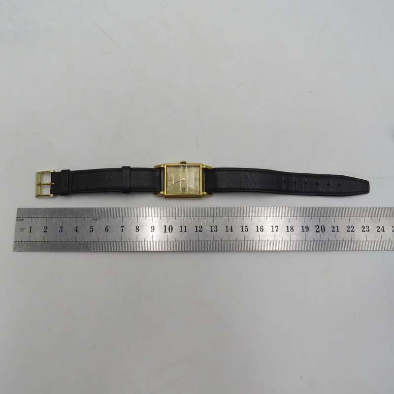 Vintage 18kt Gold Gubelin manual wind watch - working