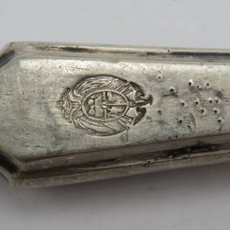 Antique pickle fork with ZAR Transvaal coat of arms on handle.