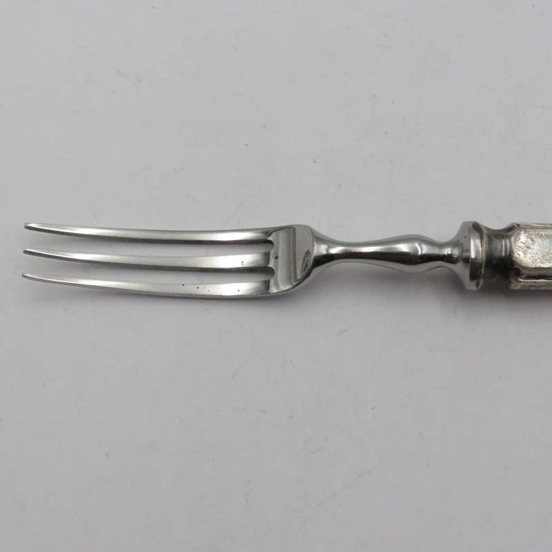 Antique pickle fork with ZAR Transvaal coat of arms on handle.