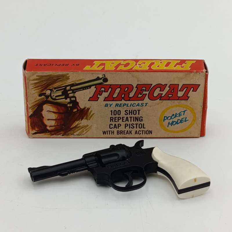 Vintage Firecat by Replicast 100 shot repeating cap pistol with break action - mint boxed