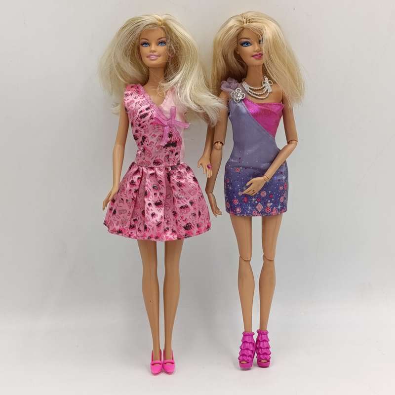 Two dolls fully clothed
