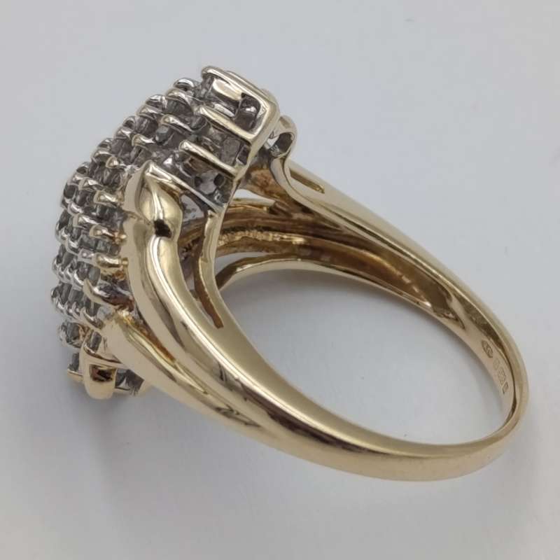 14kt gold ring with 57 diamonds weight 6.3g