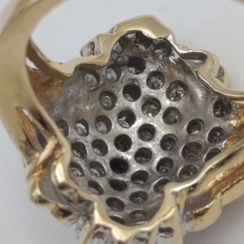 14kt gold ring with 57 diamonds weight 6.3g