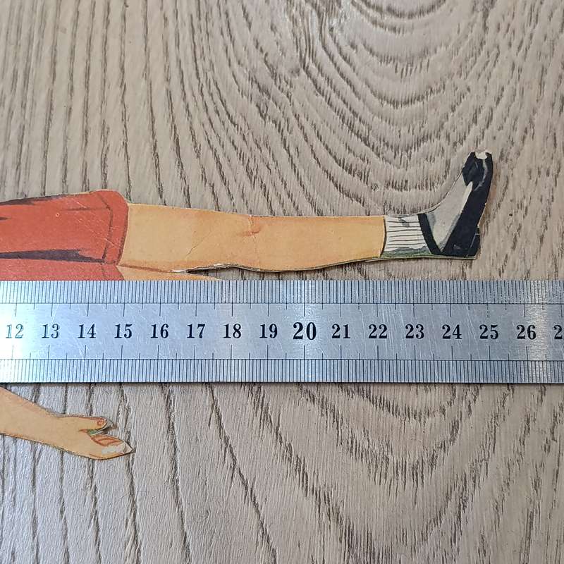 Large lot of vintage paper dolls with various dresses