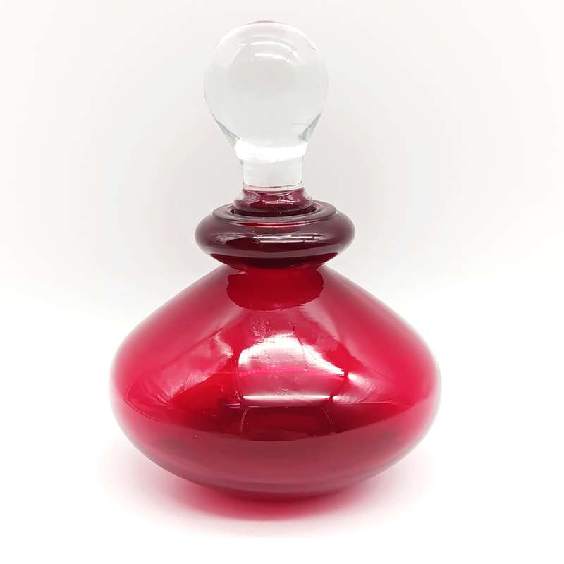 Vintage Ruby Red Bottle with clear glass lid