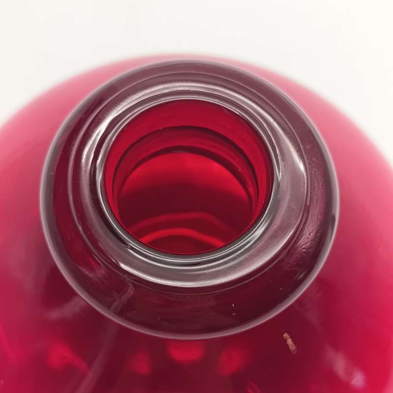 Vintage Ruby Red Bottle with clear glass lid