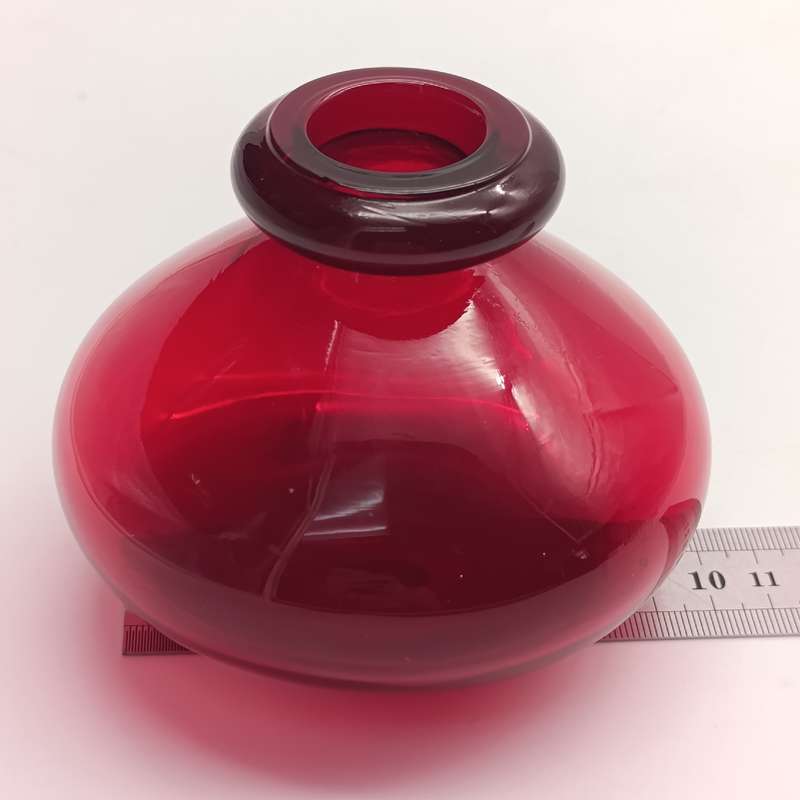 Vintage Ruby Red Bottle with clear glass lid