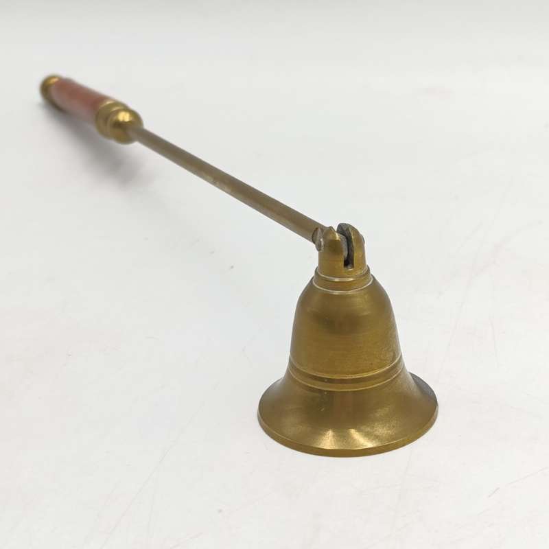 Vintage brass candle snuffer