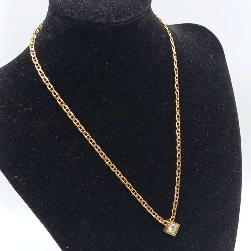 9Kt gold chain with 18kt gold pendant with diamond of over a carat