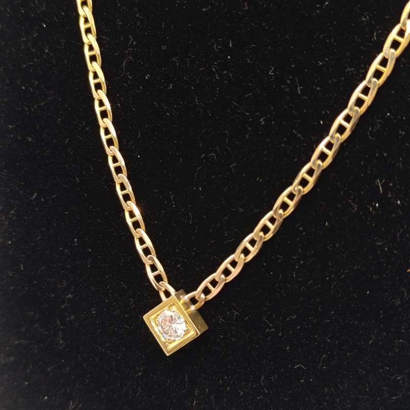 9Kt gold chain with 18kt gold pendant with diamond of over a carat