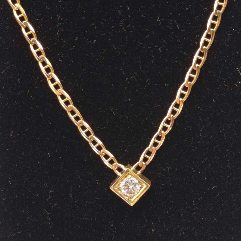 9Kt gold chain with 18kt gold pendant with diamond of over a carat