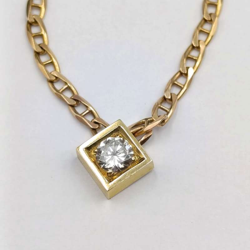 9Kt gold chain with 18kt gold pendant with diamond of over a carat