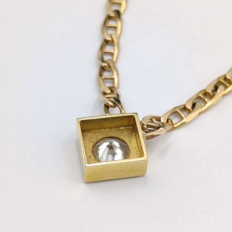 9Kt gold chain with 18kt gold pendant with diamond of over a carat