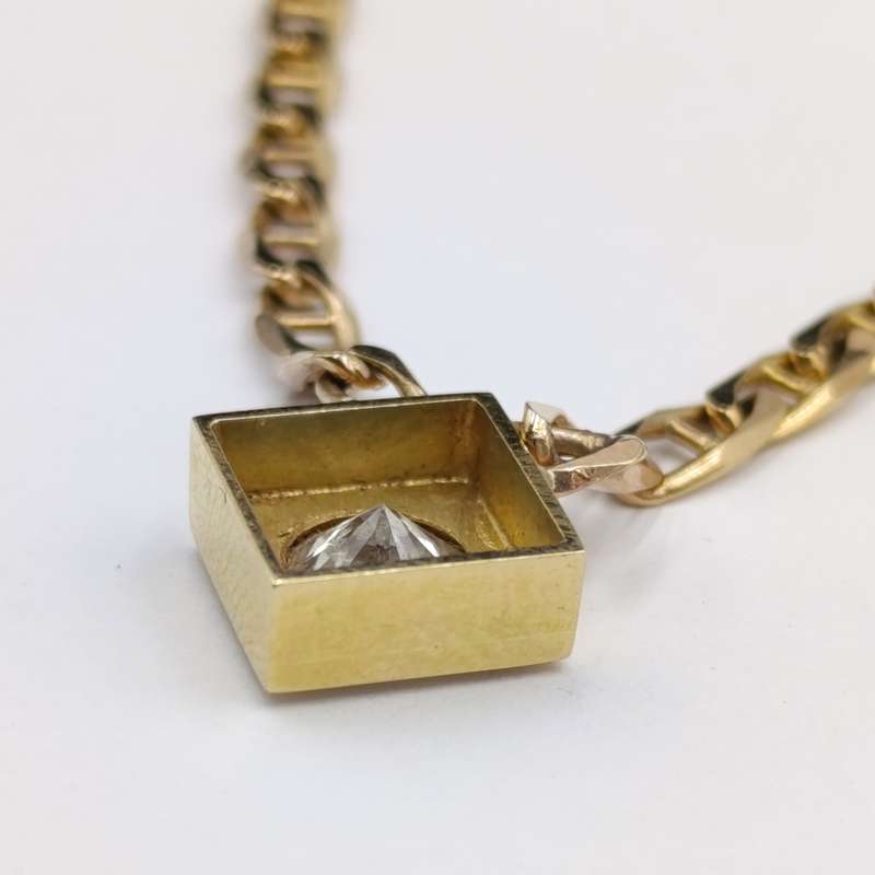 9Kt gold chain with 18kt gold pendant with diamond of over a carat