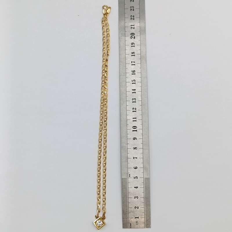 9Kt gold chain with 18kt gold pendant with diamond of over a carat