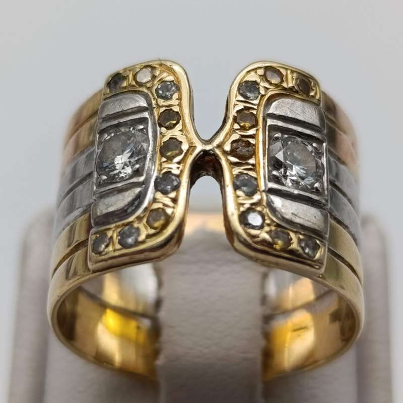 Beautiful 14 kt yellow, white and rose gold ring with 2 clear white diamonds of about 0,25 ct each