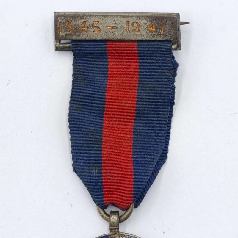 1945-1947 Safe Driving Award medal issued to TD 1150 J. Lutley