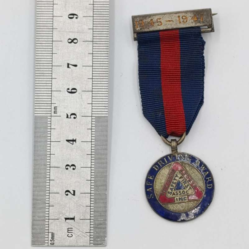 1945-1947 Safe Driving Award medal issued to TD 1150 J. Lutley