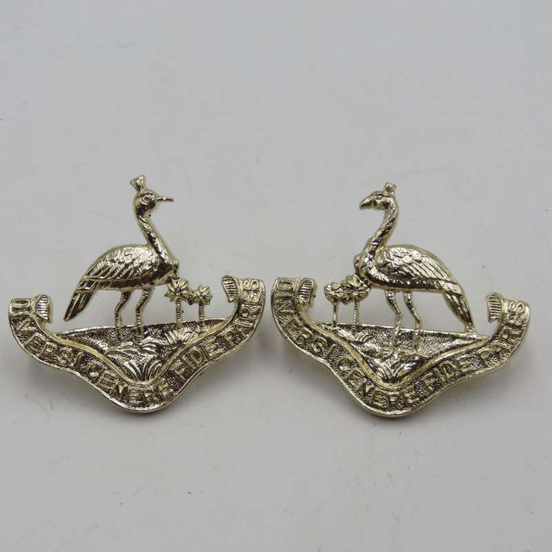 Pair of Northern Rhodesia regiment collar badges