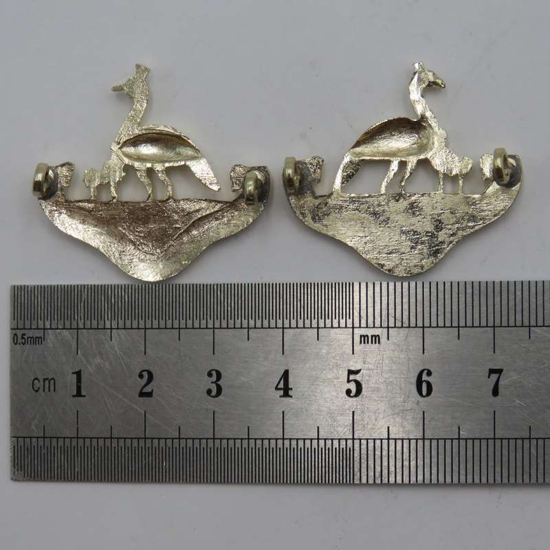 Pair of Northern Rhodesia regiment collar badges