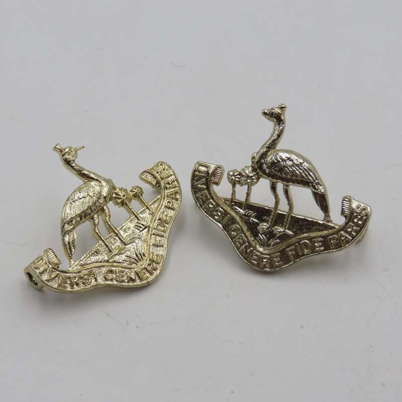 Pair of Northern Rhodesia regiment collar badges