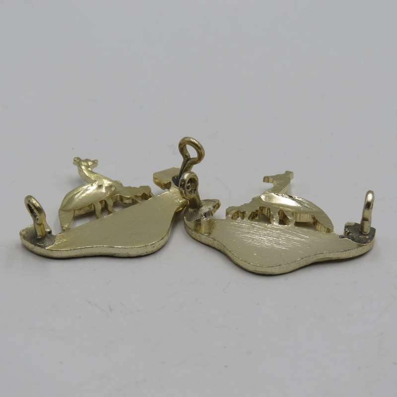 Pair of Northern Rhodesia regiment collar badges