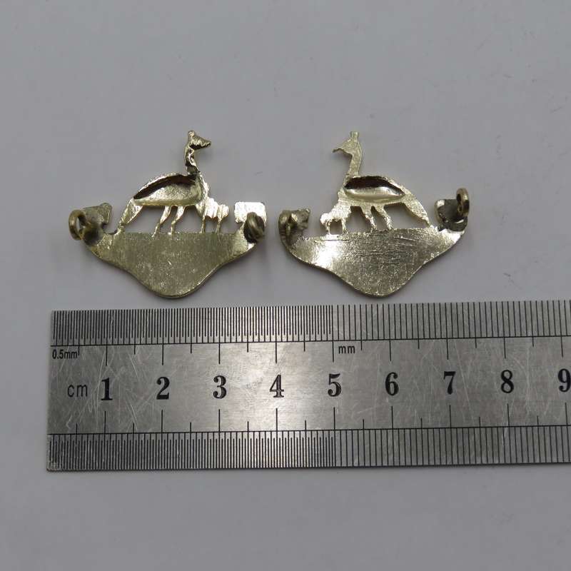 Pair of Northern Rhodesia regiment collar badges