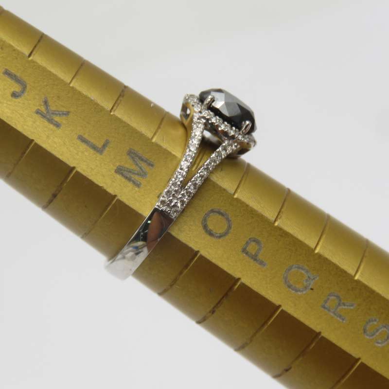 9kt White gold ring with black diamond of over 1ct plus 60 small diamonds - Size N