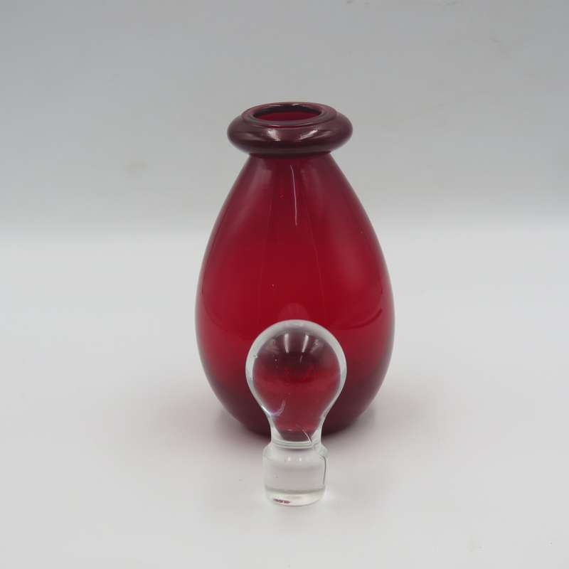 Vintage Ruby Red Bottle with clear glass lid - Chipped