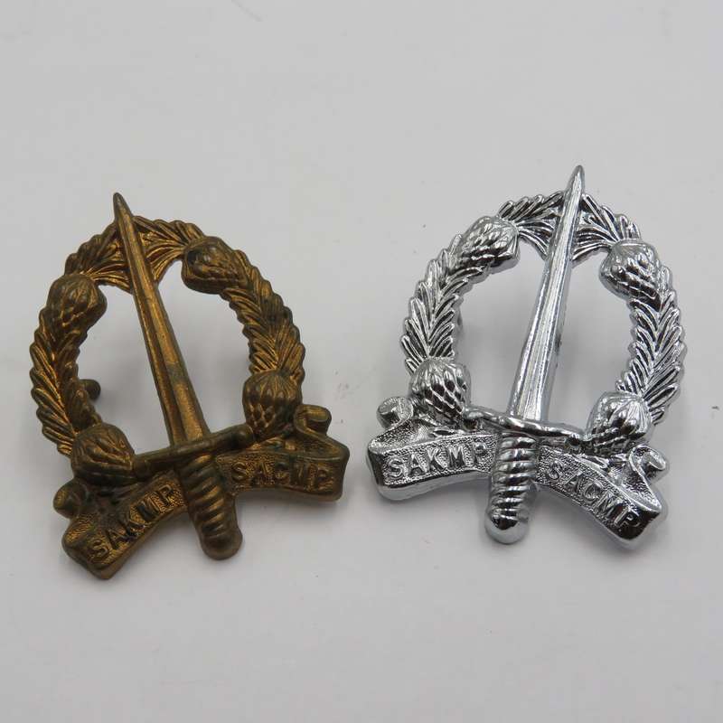 Lot of 2 different SA Corps of Military Police cap badges