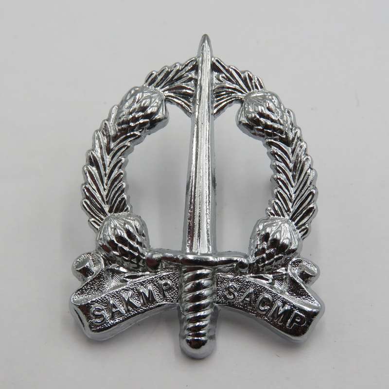 Lot of 2 different SA Corps of Military Police cap badges